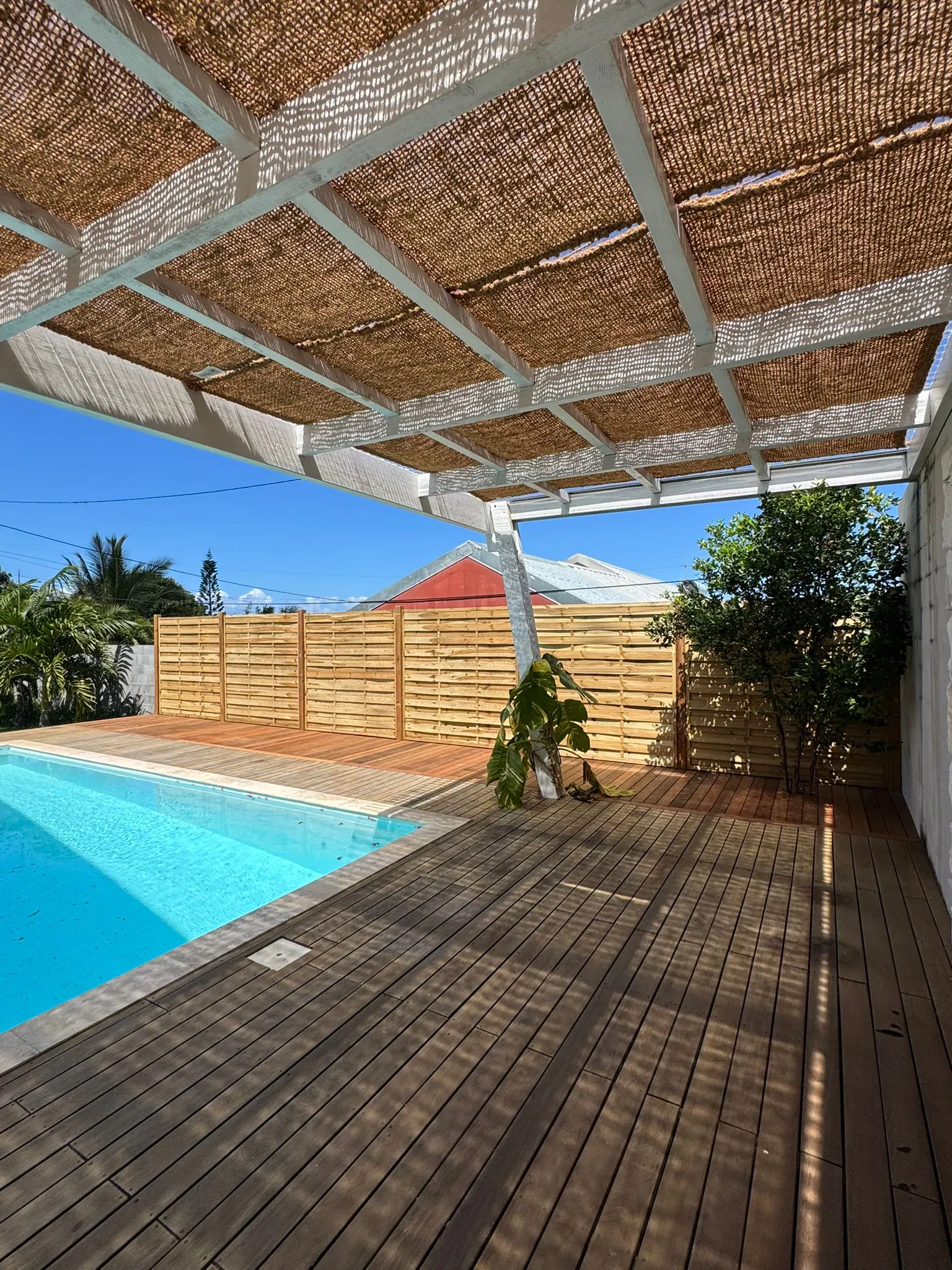 Extension d'un deck bois, palissade et traitement